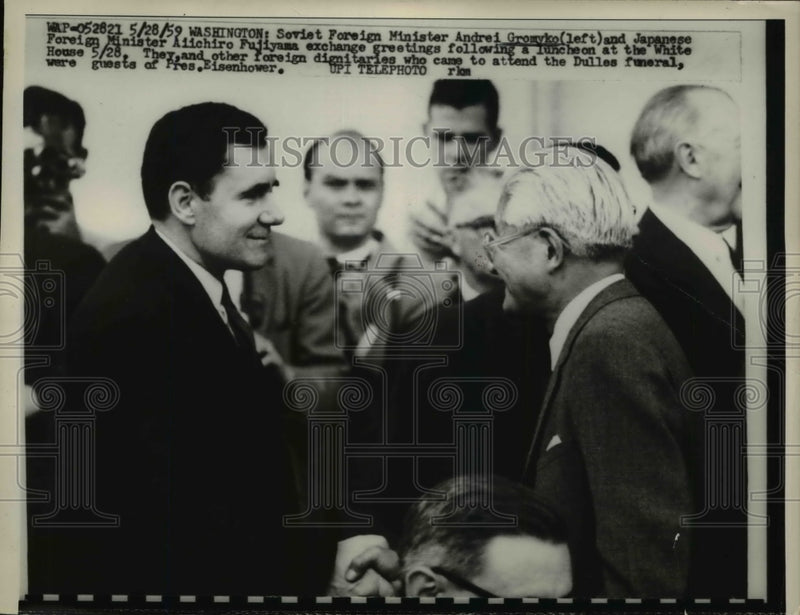 Load image into Gallery viewer, 1959 Press Photo Andrei Gromyko, Aiichiro Fujiyama exchange greeting - nep03760

