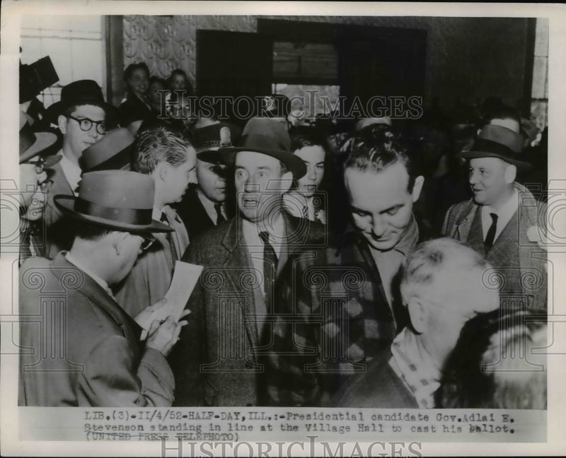 Load image into Gallery viewer, 1952 Press Photo Gov. Adlai tevenson Casts His Ballot At The Village Hall

