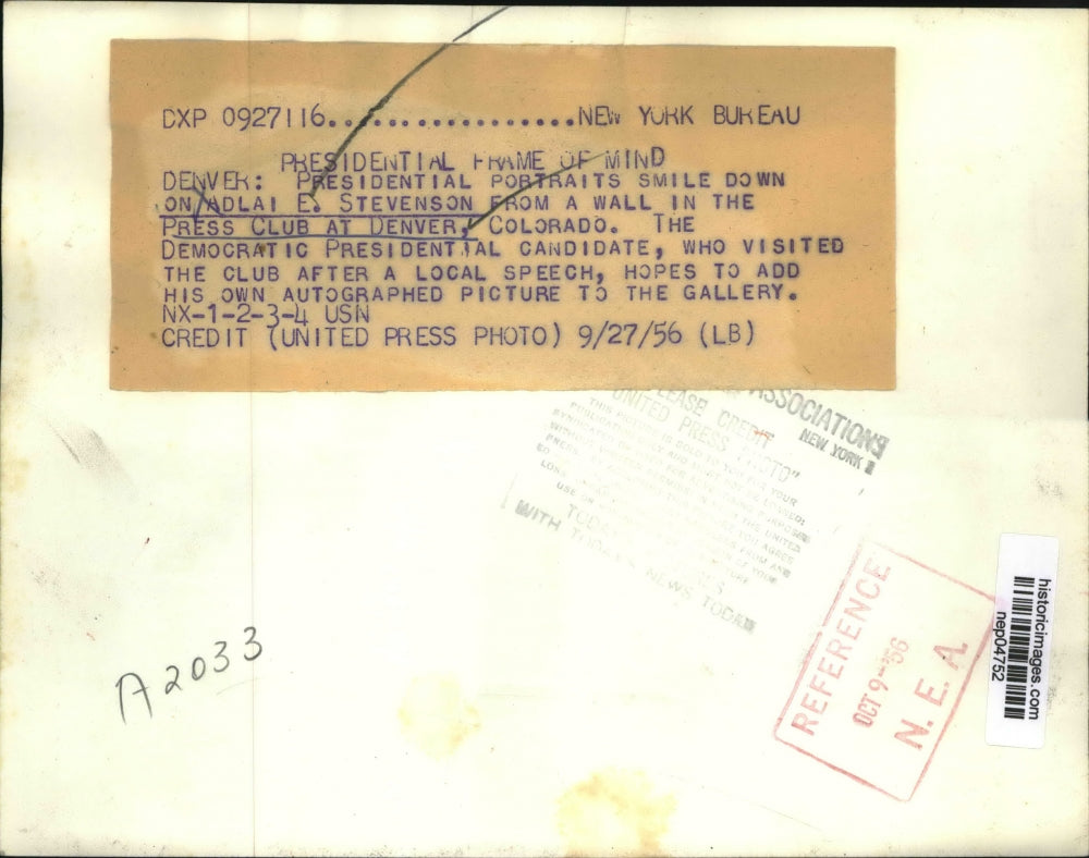 1956 Press Photo Adlai Stevenson Looks At The Portrait In The Press Club