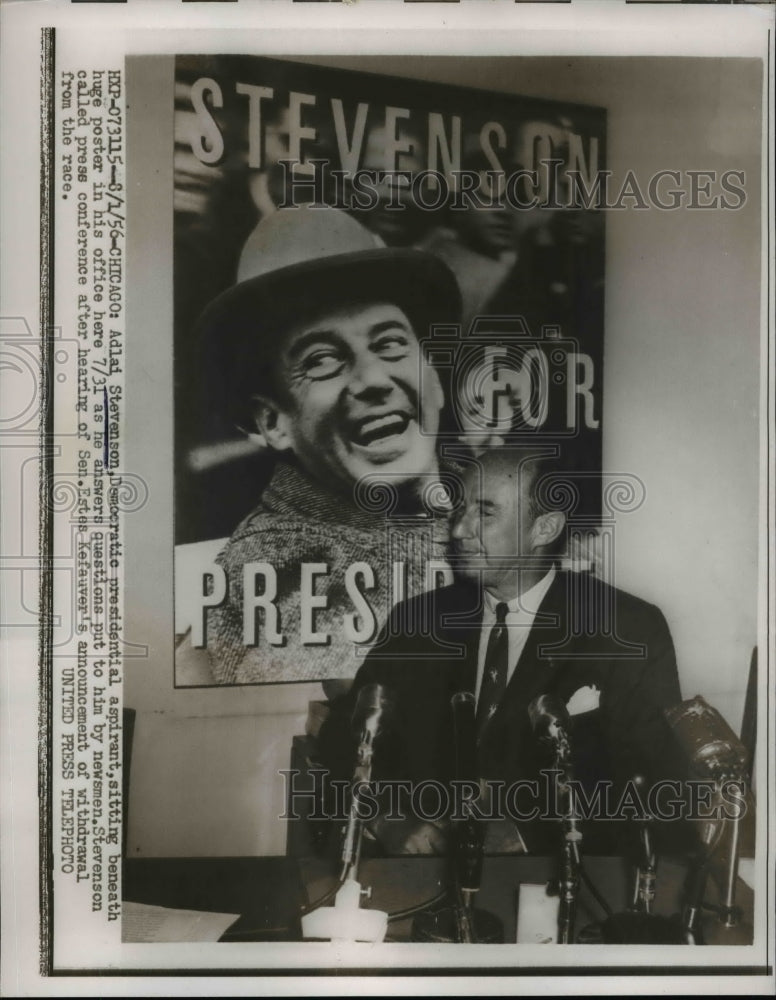 1956 Press Photo Adlai Stevenson Sitting Beneath Huge Poster In His Office