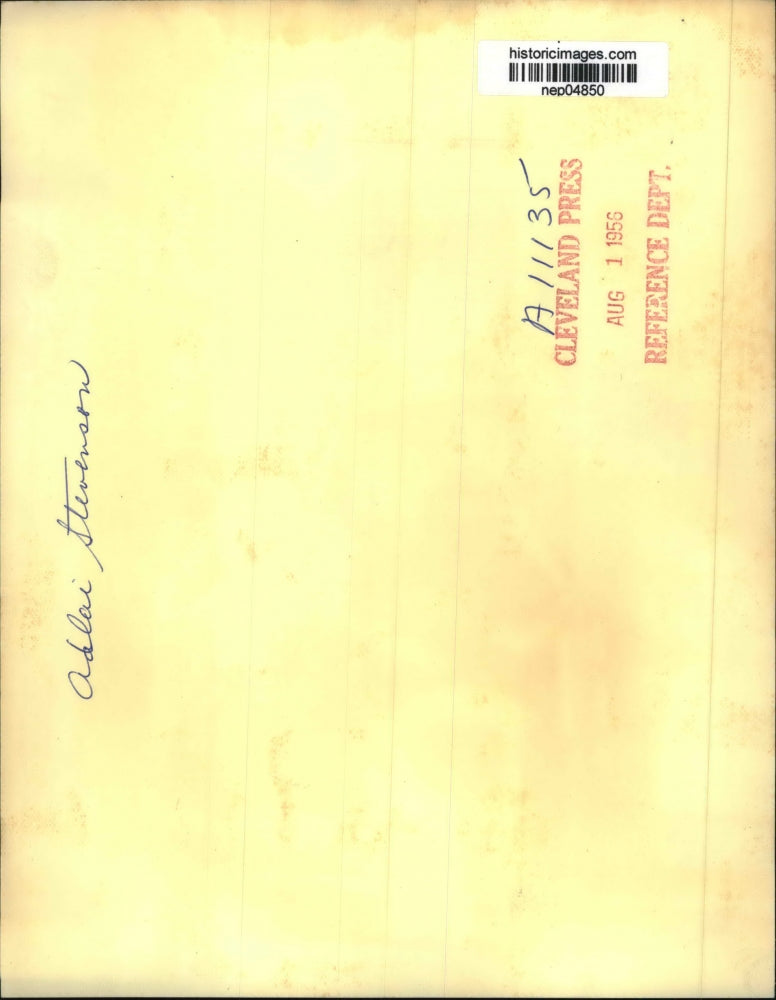 1956 Press Photo Adlai Stevenson Sitting Beneath Huge Poster In His Office