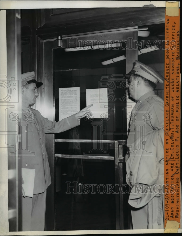 1944 Press Photo Army Occupation Notice on Cleveland Graphite Bronze Door