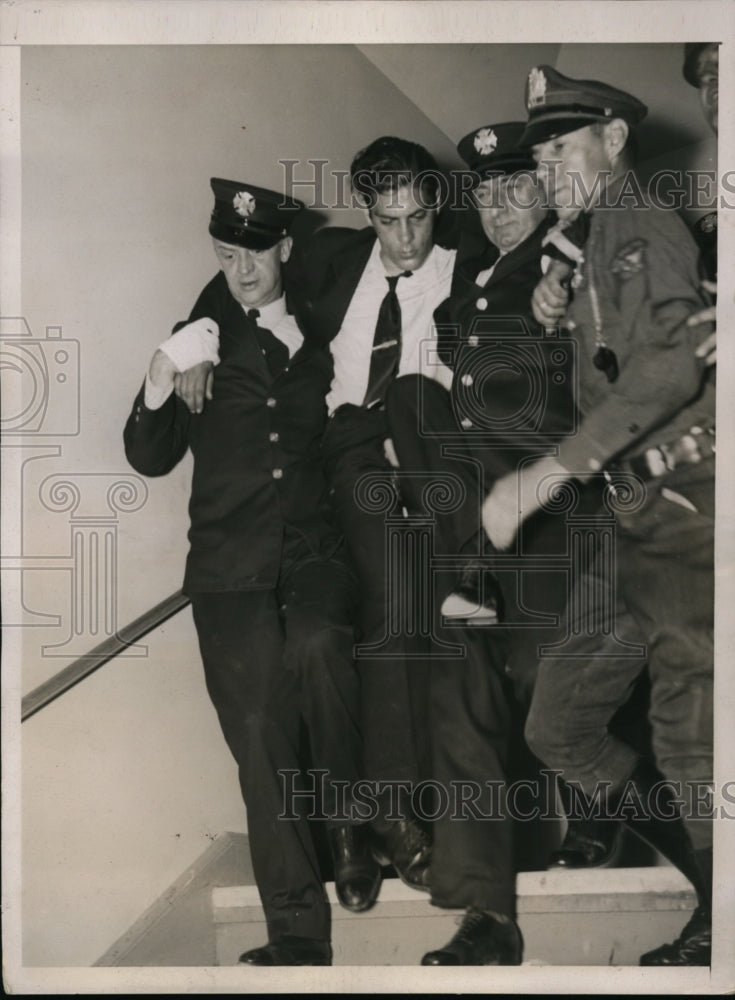 1936 Press Photo Police & Firemen Carrying Injured Man Outside Convention Riot