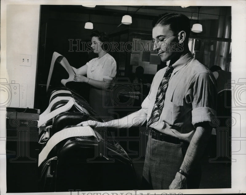 Load image into Gallery viewer, 1947 Press Photo Lee Fishman, Lois Moralez Master Radio Department Employees
