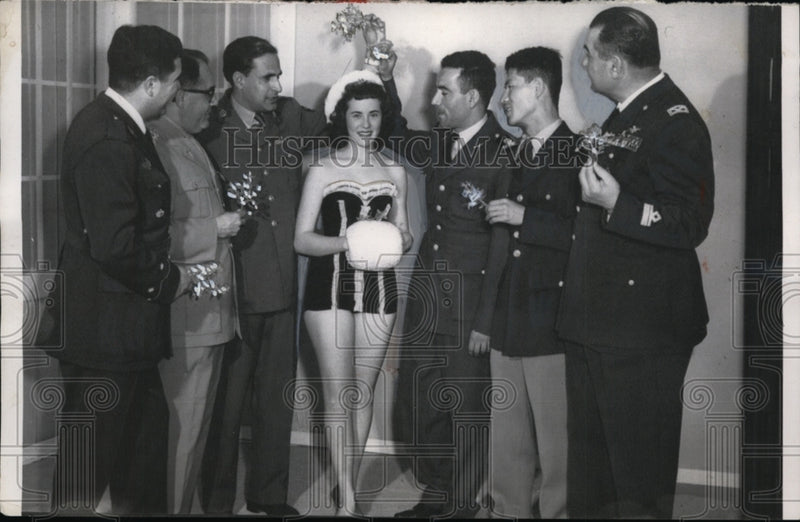 Load image into Gallery viewer, 1957 Press Photo Terry Foulds Under Mistletoe at Lackland Air Force Base, Texas

