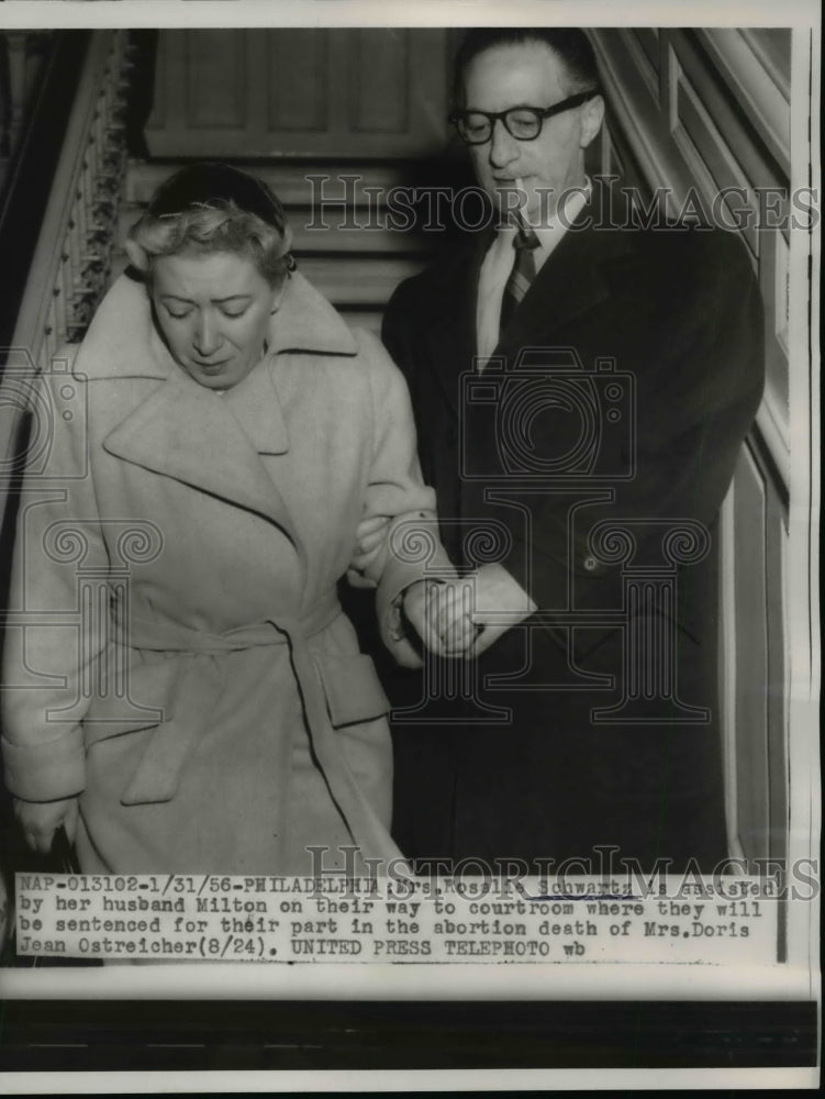 Load image into Gallery viewer, 1956 Press Photo Mr &amp; Mrs Milton Schwartz Leave for Courtroom for Their Sentence
