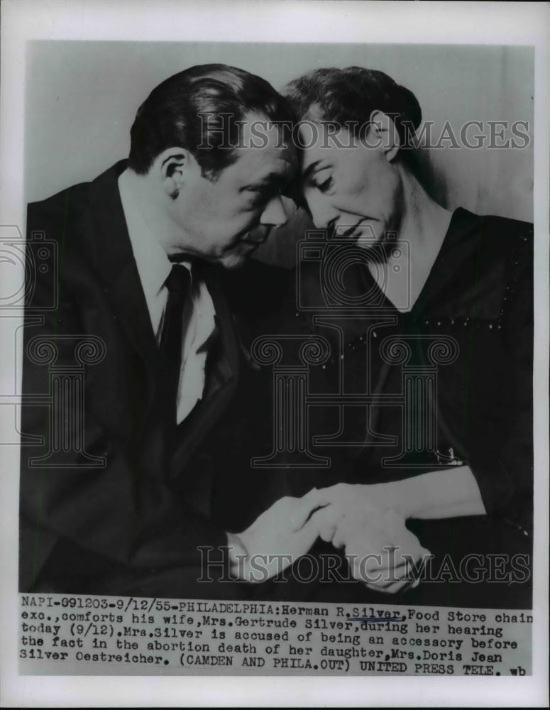 Load image into Gallery viewer, 1955 Press Photo Herman R. Silver Comforts Wife Gertrude During Court Hearing
