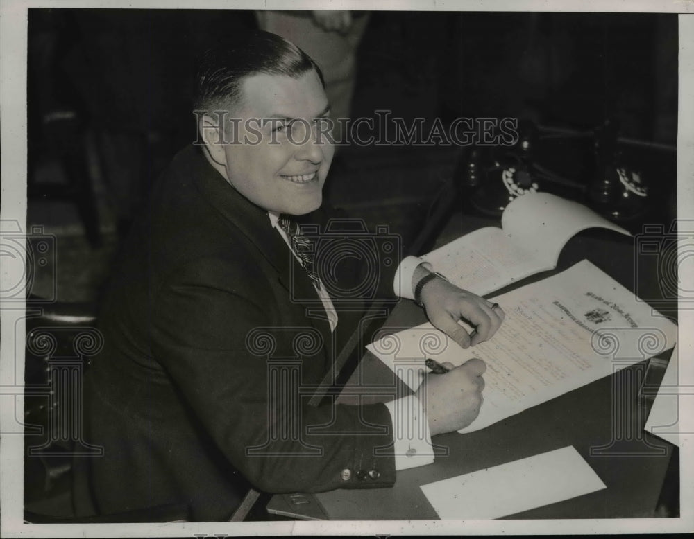 1937 Press Photo Gov H. Hoffman Signs Bill Re-Appointing Justice T. Trenchard