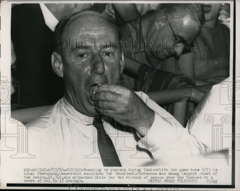 Load image into Gallery viewer, 1956 Press Photo Dem Candidate Adlai Stevenson Eats Popcorn at Yanks-W Sox Game
