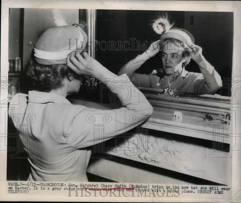 Load image into Gallery viewer, 1949 Press Photo Sen Margaret Chase Smith Tries on Easter Hat - nep08730
