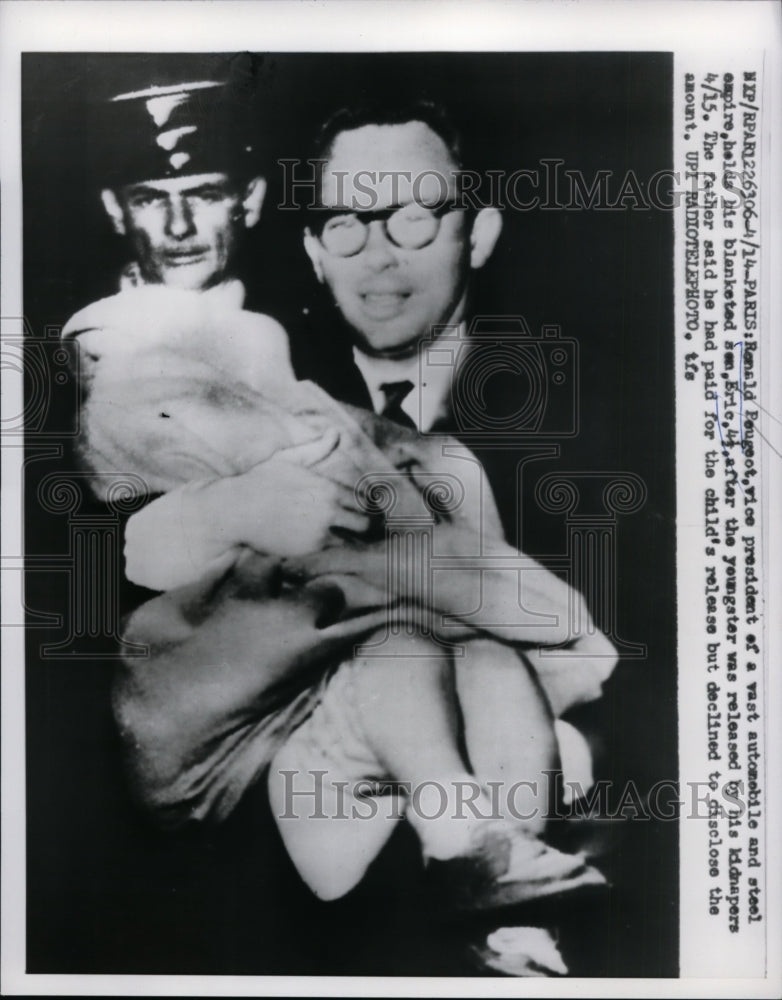 Load image into Gallery viewer, 1960 Press Photo Ronald Peugeot Holds Kidnapped Son Eric After His Release
