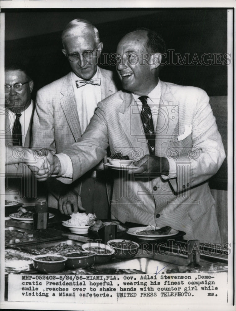 1956 Press Photo Adlai Stevenson Shakes with Counter Girl at Miami Cafeteria