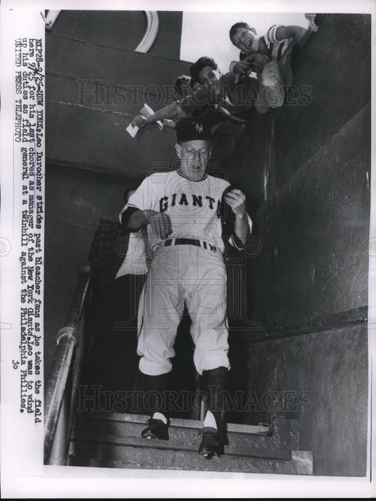 1955 Press Photo Giants Leo Durocher passes fans as he takes field for last time- Historic Images