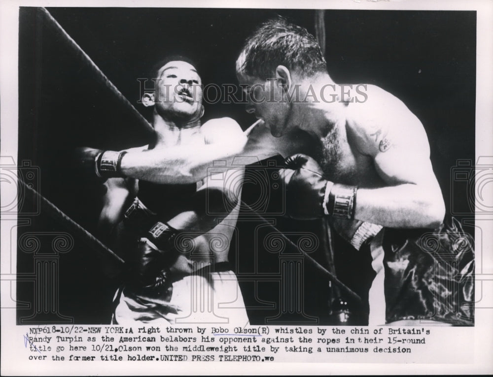 1953 Press Photo NYC Carl Bobo Olson right hook to Randy Turpin - nes26019- Historic Images