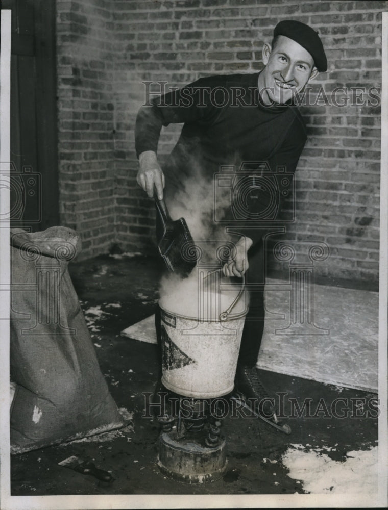 1935 Press Photo Bobby McLean speed skater builds rink at his Chicago home- Historic Images