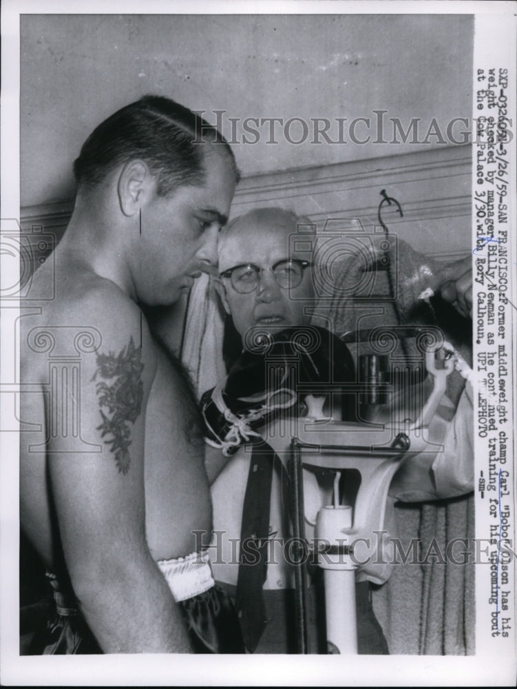 1959 Press Photo Former middleweight champ Csrl Olson has weight checked- Historic Images