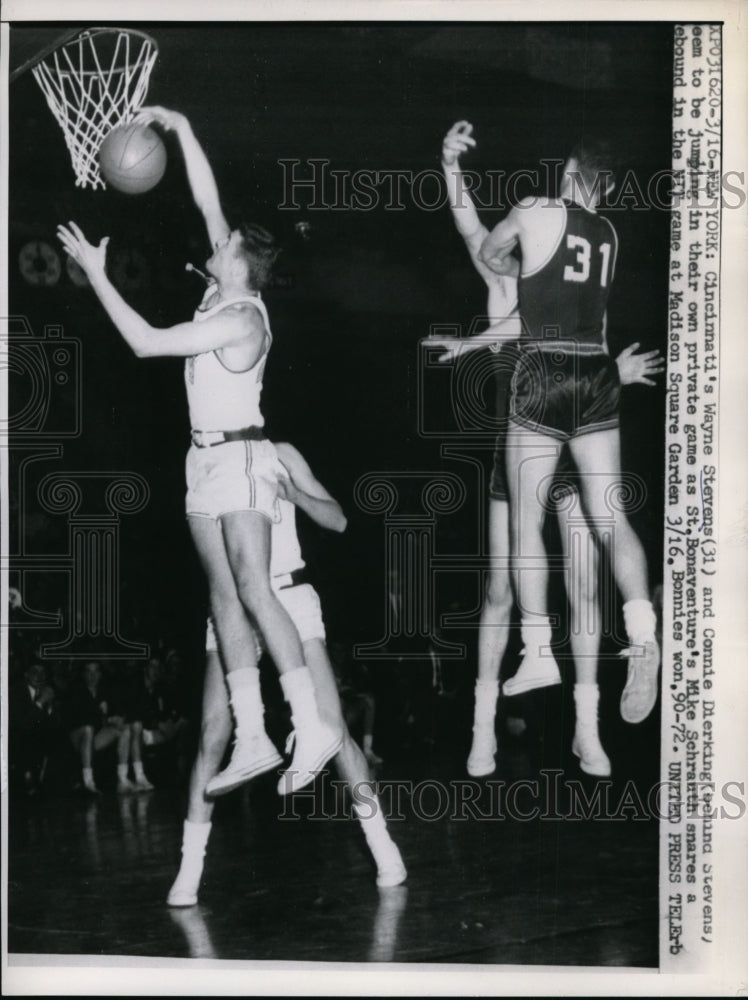 1957 Press Photo St Bonaventures Mike Schrauth grabs rebound - nes28513- Historic Images