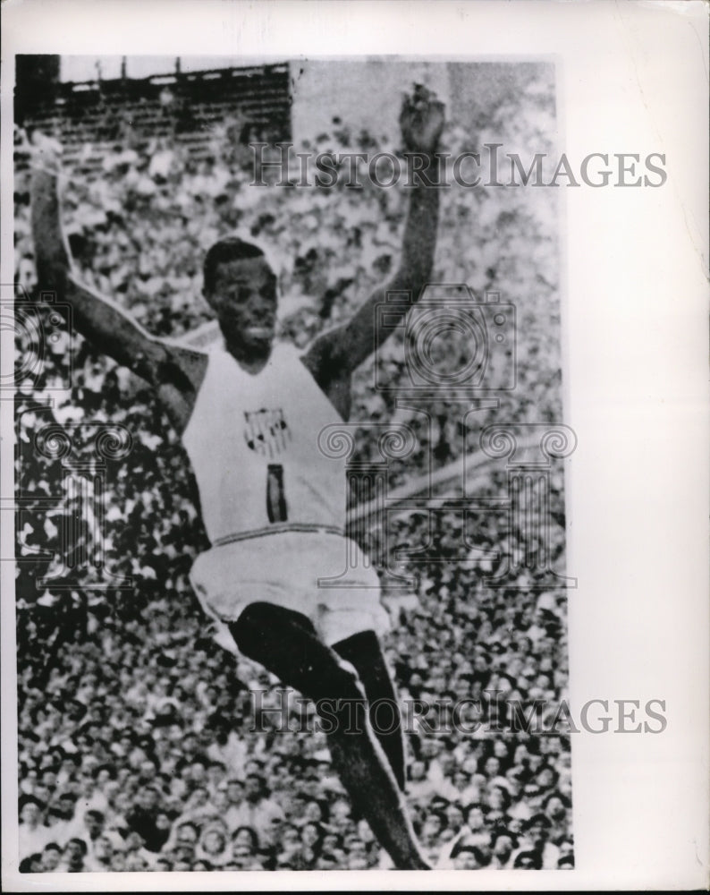 1961 Press Photo Ralph Boston leaps to new world mark in broad jump event- Historic Images