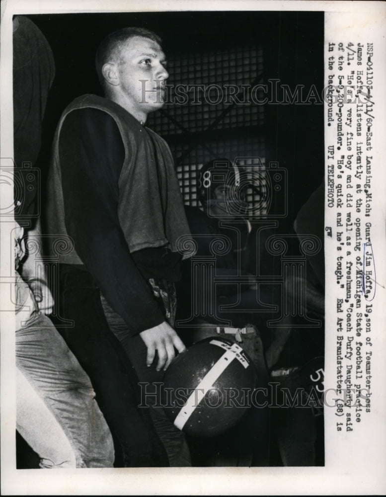 1960 Press Photo Michigan State guard Jim Hoffa listens at start of practice- Historic Images