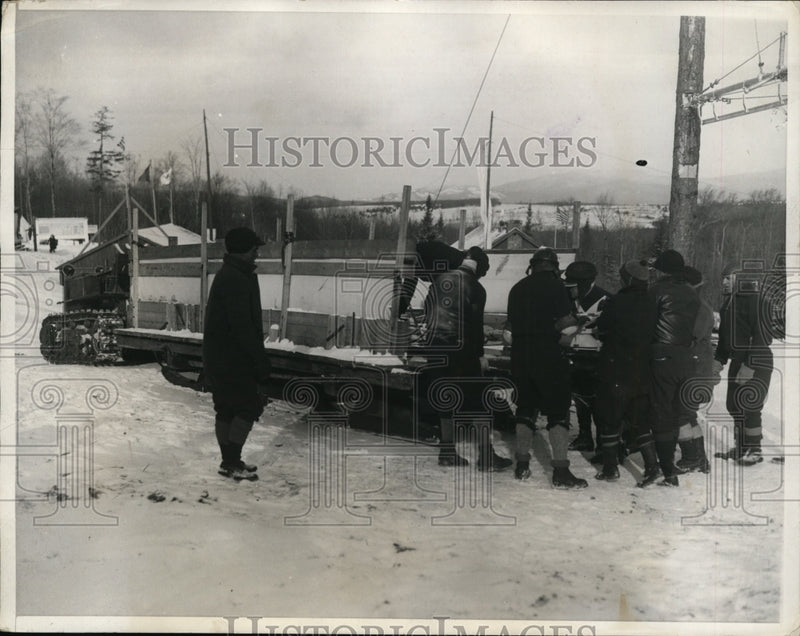 Load image into Gallery viewer, 1932 Press Photo Olympic bobsled loaded on tractor to haul it to next run
