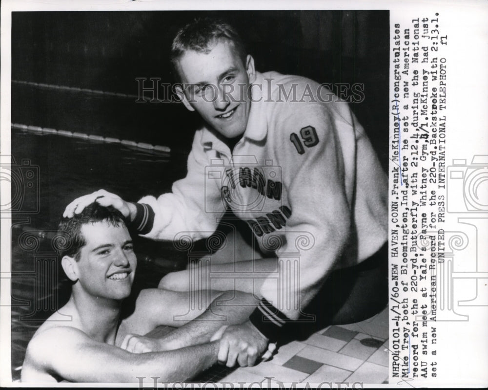 1960 Press Photo Frank McKinney congratulates Mike Troy after he set new record