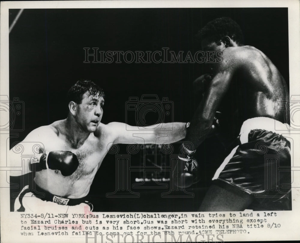 1949 Press Photo Challenger Gus Lesnevich tries to land left on Izzard Charles- Historic Images