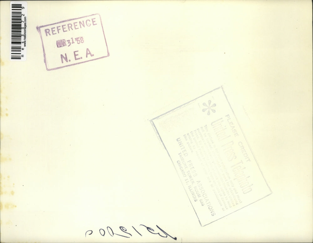 1958 Press Photo Seven footer Mike McCoy trips and falls - nes33729