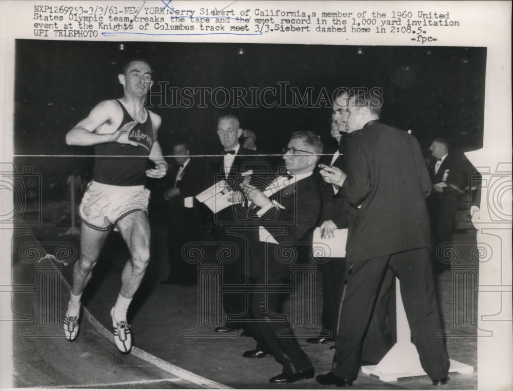 1961 Press Photo Jerry Siebert in 1000 yard Knights of Columbus track meet- Historic Images