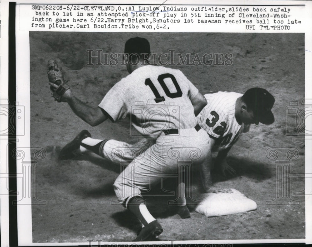 1962 Press Photo Indian Al Luplow slides to 1st vs Senators Harry Bright- Historic Images