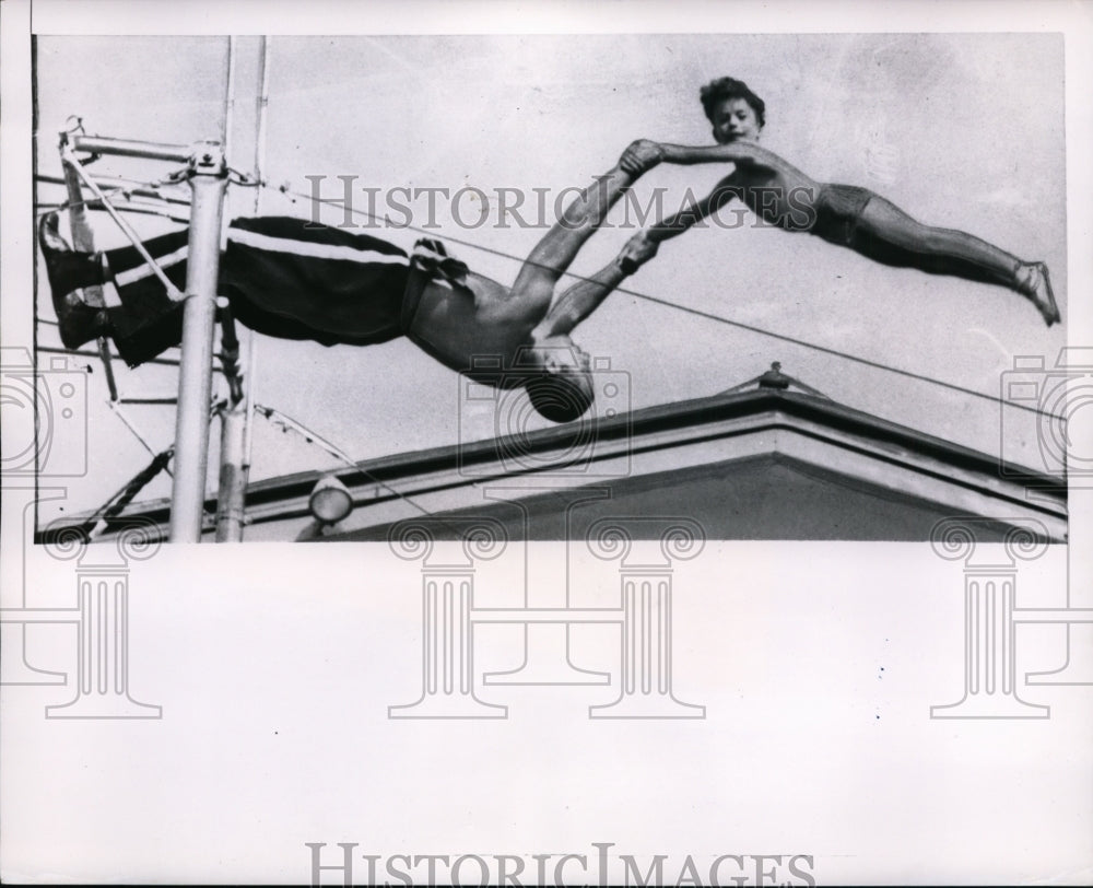 1951 Press Photo Sandy PDobrich &amp; father on a trampoline exhibition - nes39397- Historic Images