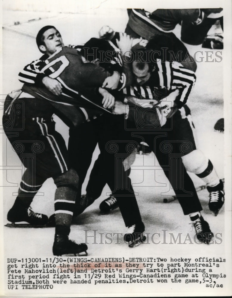 Press Photo Redwings Gerry Hart vs Canadiens Pete Mahovlich at Detroit- Historic Images