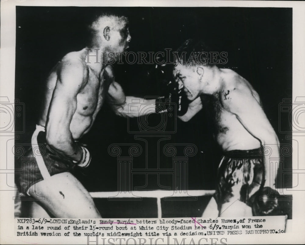 1953 Press Photo Randy Turpin batters Charles Humez at boxing in London