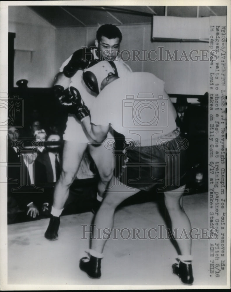 1949 Press Photo Champ Joe Louis trains with George Fitch for Billy Conn bout- Historic Images