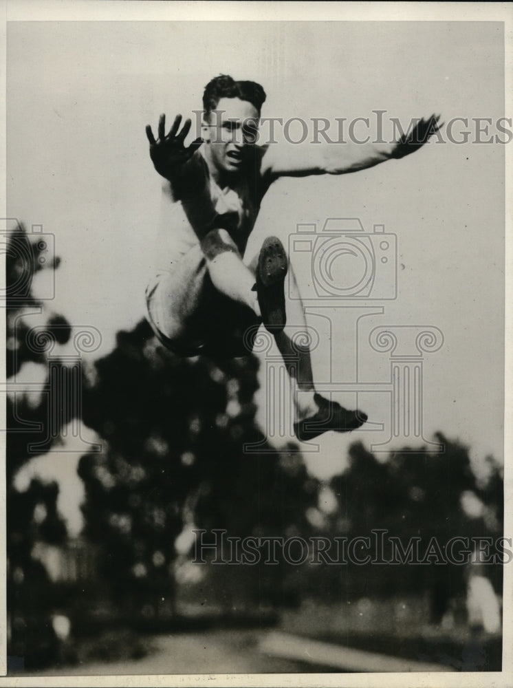 1931 Press Photo Arnie West Stanfor broad jumper at IC4A meet - nes40893- Historic Images