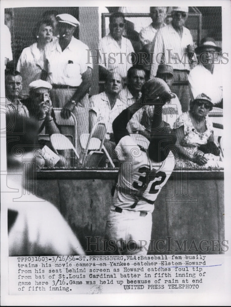 1956 Press Photo Yankee Elston Howard catches foul from Cardinal in Florida game- Historic Images