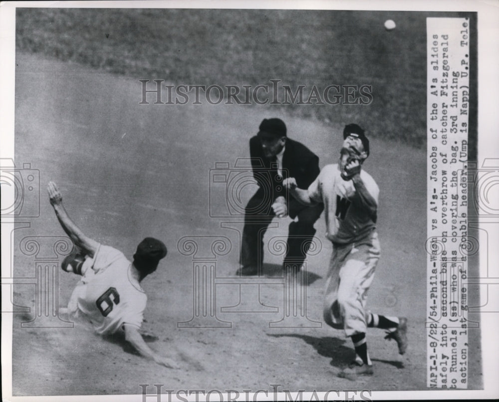 1944 Press Photo A&#39;s Jacobs slides safe at 2nd vs Runnels of Senators- Historic Images