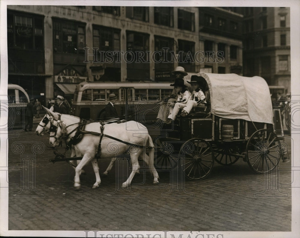 1937 Press Photo Rodeo parade and conestoga wagon in New York City - nes44217- Historic Images