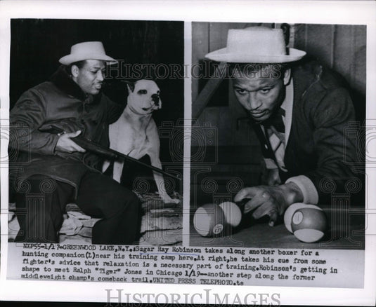 1955 Press Photo Sugar Ray Robinson boxer takes time to hunt & shoot pool- Historic Images