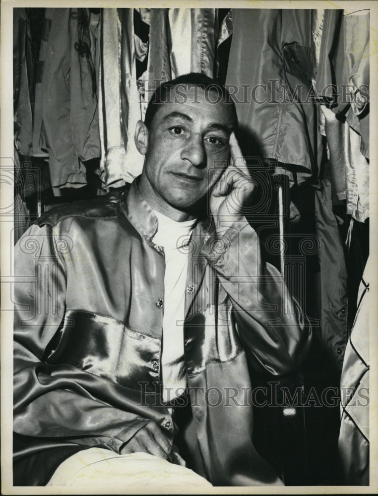 1961 Press Photo Jockey Eddie Arcaro in lockerroom at a track - nes45884- Historic Images