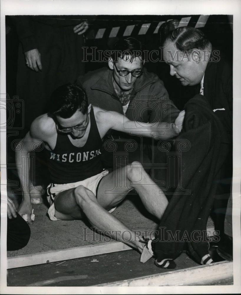 1952 Press Photo Don Gehrmann injured on track at Kinights of Columbus meet- Historic Images