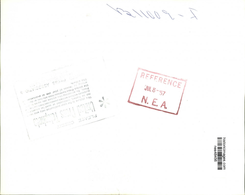 1957 Press Photo Jimmy Daywalt race car spins out at Indianapolis Indiana