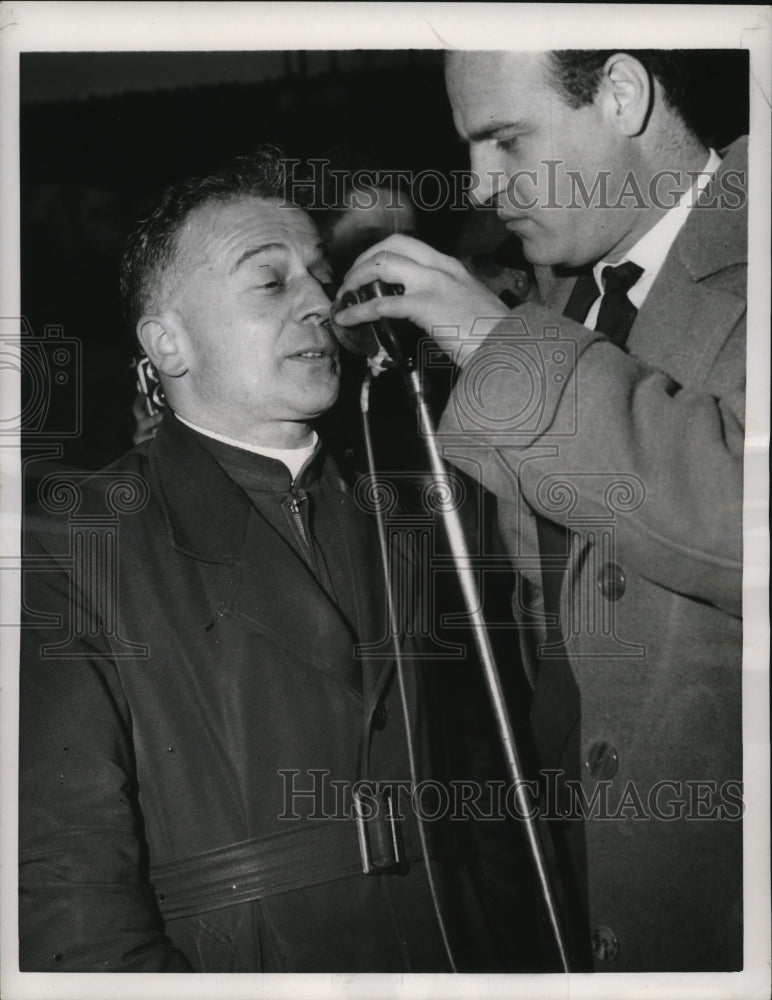 1957 Press Photo Father Simon talks after diving into Marne River for charity- Historic Images