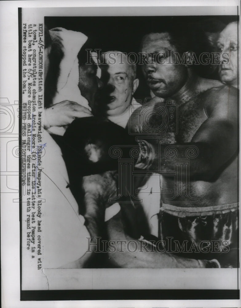 1956 Press Photo British boxer Yolande Pompey congratulates rival Archie Moore- Historic Images