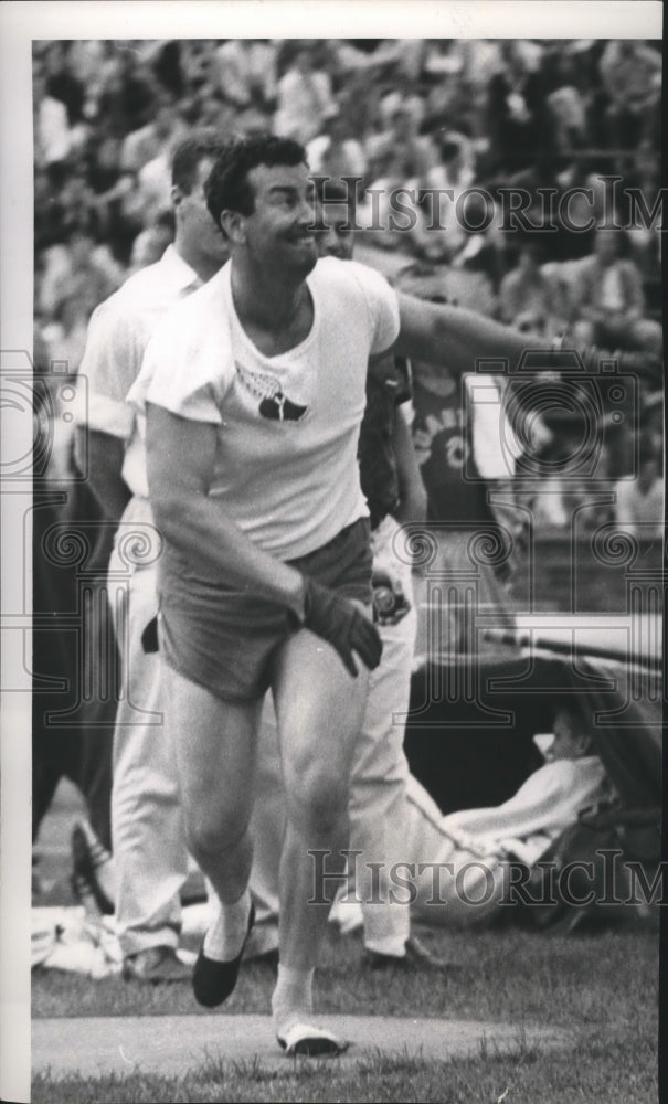 1959 Press Photo Robert Backus takes first place, 56 lb weight throw at AAU meet- Historic Images