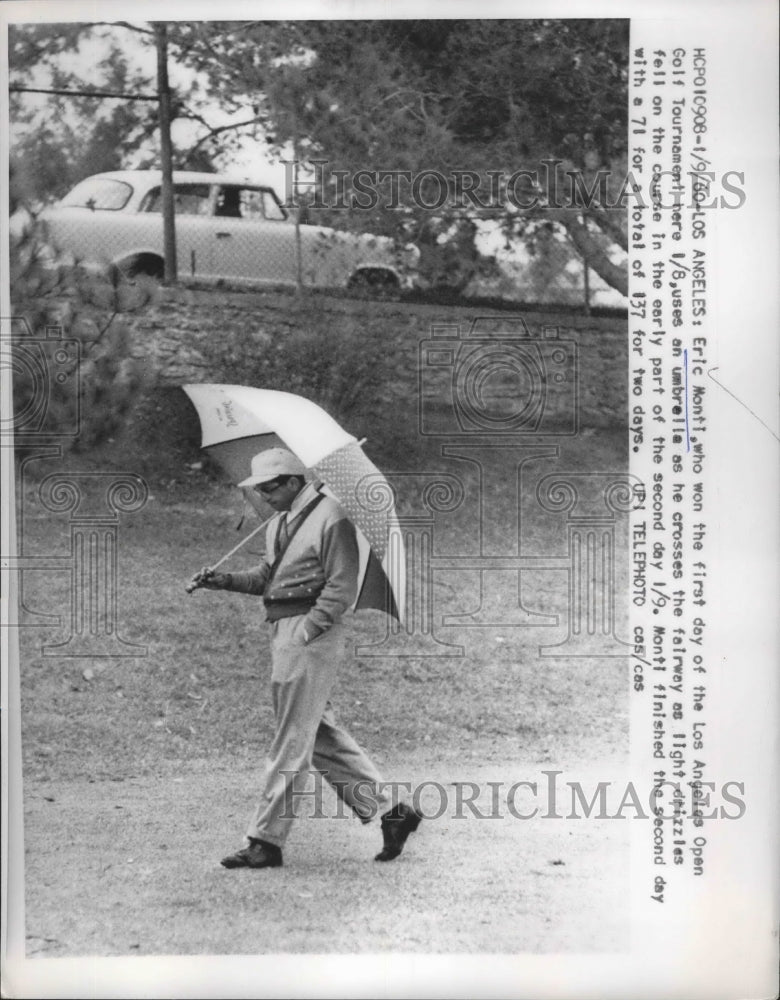 1960 Press Photo Eric Monti on rainy 2nd day of Los Angeles Open - nes53026- Historic Images