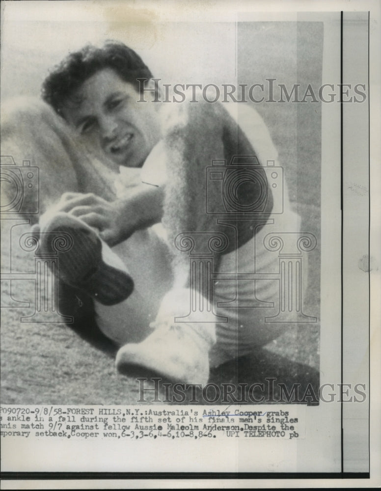 1958 Press Photo Ashley Cooper falls during National Tennis match in NY- Historic Images