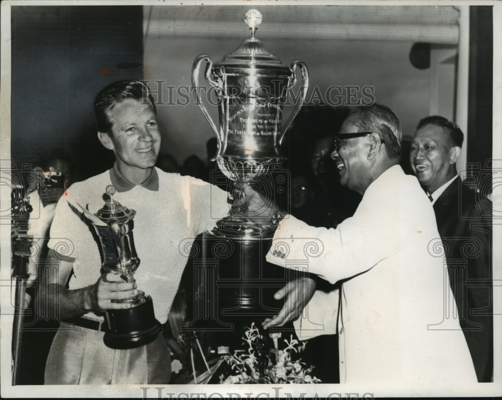 1966 Press Photo Harold Henning recieving trophies for golf - nes54797- Historic Images