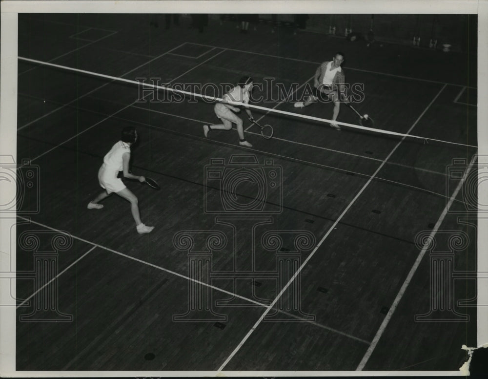 1936 Press Photo Players in action on a badminton court - nes54827- Historic Images