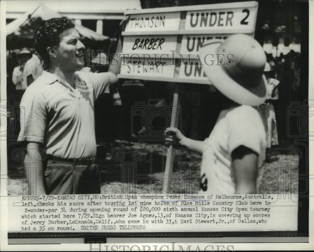 1954 Press Photo Peter Thomson Checking His Scores with Sign Bearer Joe Agnew- Historic Images