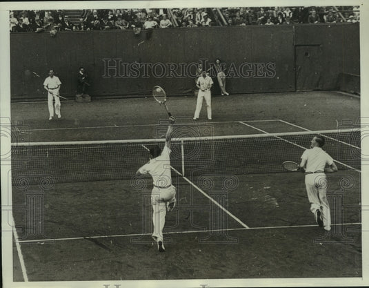 1934 Press Photo Brugnon & Borotra in Davis Cup Doubles at Paris - nes55534- Historic Images